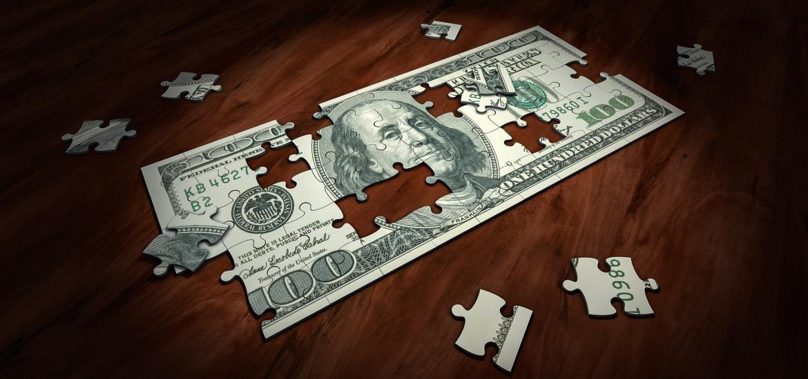 puzzle of hundred dollar bill