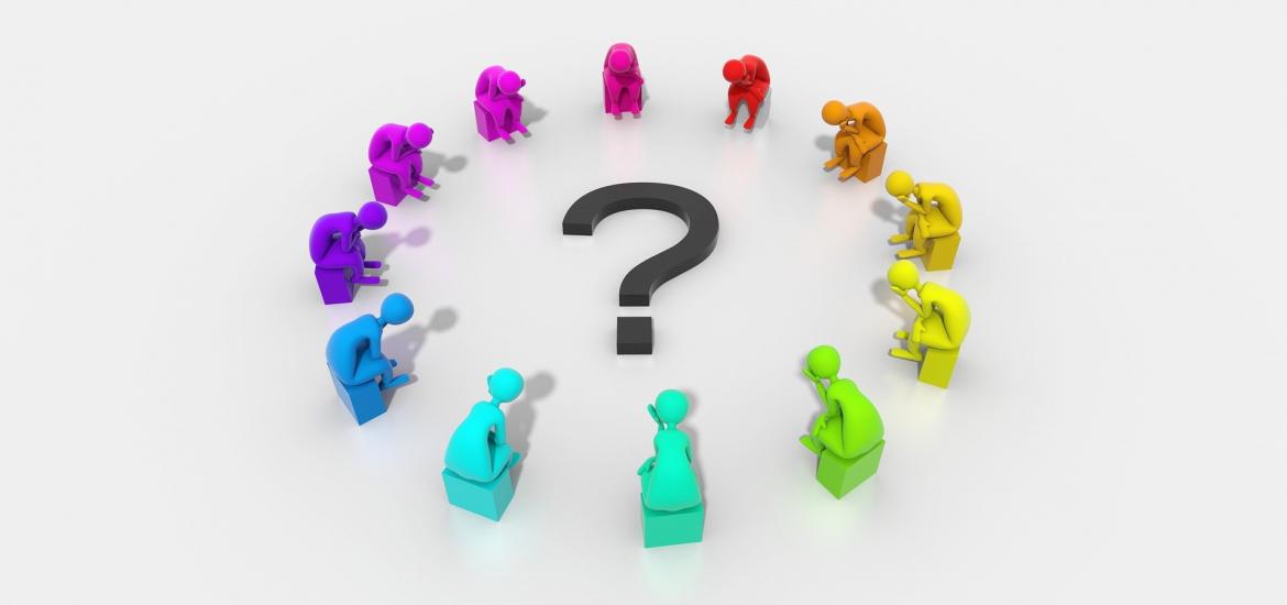 group of rainbow colored silhouettes sitting around a question mark